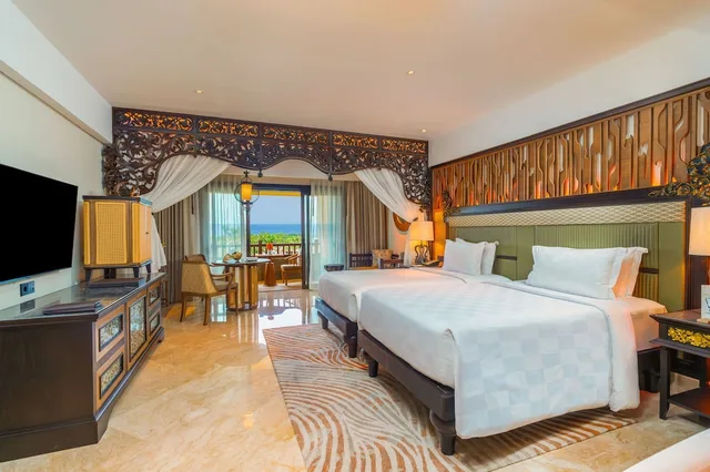 غرفة بسرير كينج بإطلالة على البحر، AYANA Resort Bali 1/2