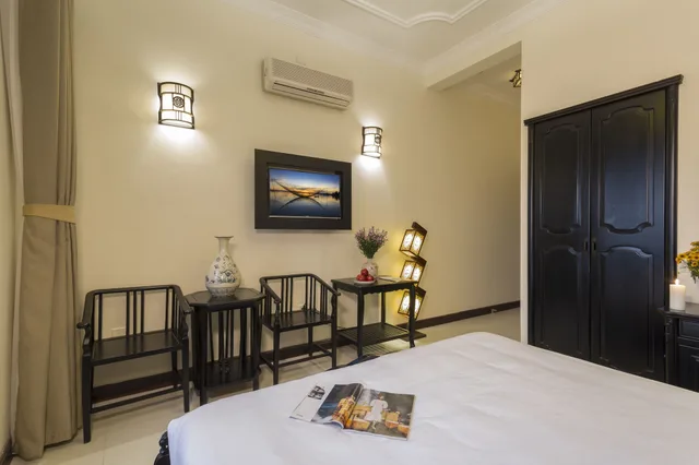 غرفة غراند بسرير كينج بإطلالة على المسبح بشرفة، Nesta Hoi An Resort and Spa 6/9
