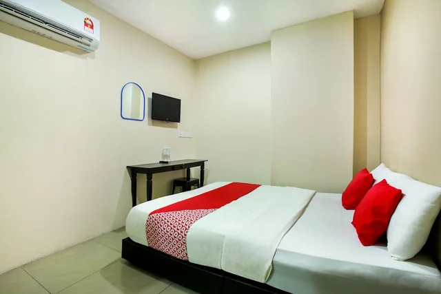 غرفة قياسية بسرير كوين، OYO 43933 Ferringhi Stay Iinn 1/7