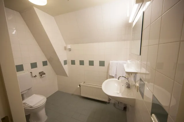غرفة عائلية بسريرين منفصلين مع أريكة، Fletcher Hotel Gilde 3/3