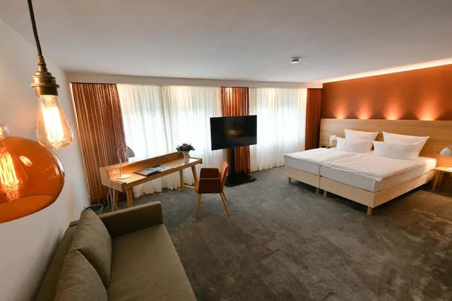 شقة بسرير كينج وسرير فردي مع أريكة، Hotel Adler Asperg 2/9