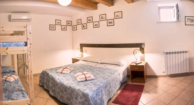 غرفة كومفورت رباعية بسرير كوين وسرير بطابقين وسرير كوين، B&amp;B La Suite 1/5