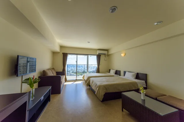 غرفة ديلوكس بسريرين منفصلين بإطلالة على البحر، Condominium Hotel Monpa 1/1