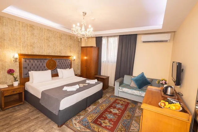 غرفة اقتصادية رباعية بسريرين منفصلين وسرير كينج مع أريكة في الطابق الأرضي، Ala Sofia Hotel 2/10