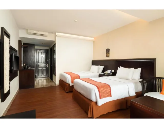 غرفة ديلوكس بسرير مزدوج أو سريرين منفصلين بإطلالة على الحديقة، Best Western Resort Kuta 1/1