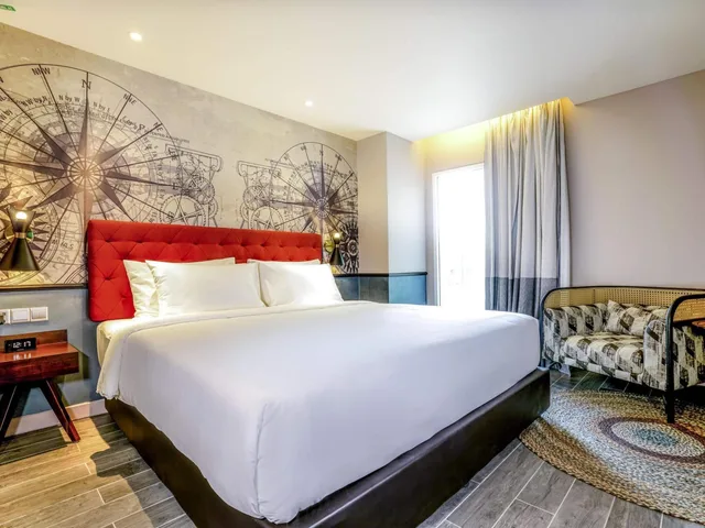 غرفة ديلوكس بسرير كينج وسرير فردي، MERCURE LANGKAWI PANTAI CENANG 3/10