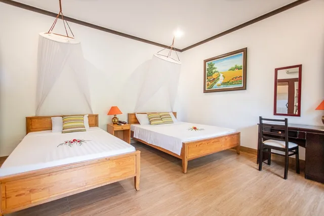 بنغل ثلاثي بسرير مزدوج وسرير فردي بإطلالة على الحديقة، Bao Quynh Bungalow 1/5