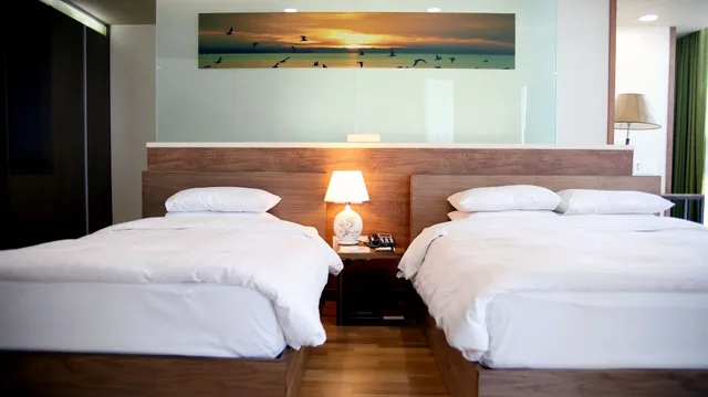 غرفة ديلوكس عائلية بسرير كوين وسرير فردي، Sunset Hotel 10/10