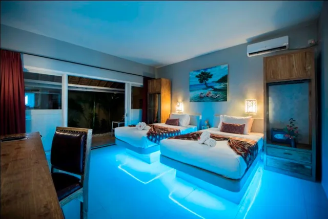 غرفة بسرير مزدوج أو سريرين منفصلين بإطلالة على المسبح، Bel Air Resort And Spa 1/1