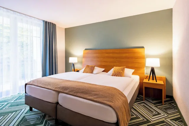 غرفة ديلوكس بسرير كوين مع أريكة في الملحق، Parkhotel Maximilian Ottobeuren 3/6
