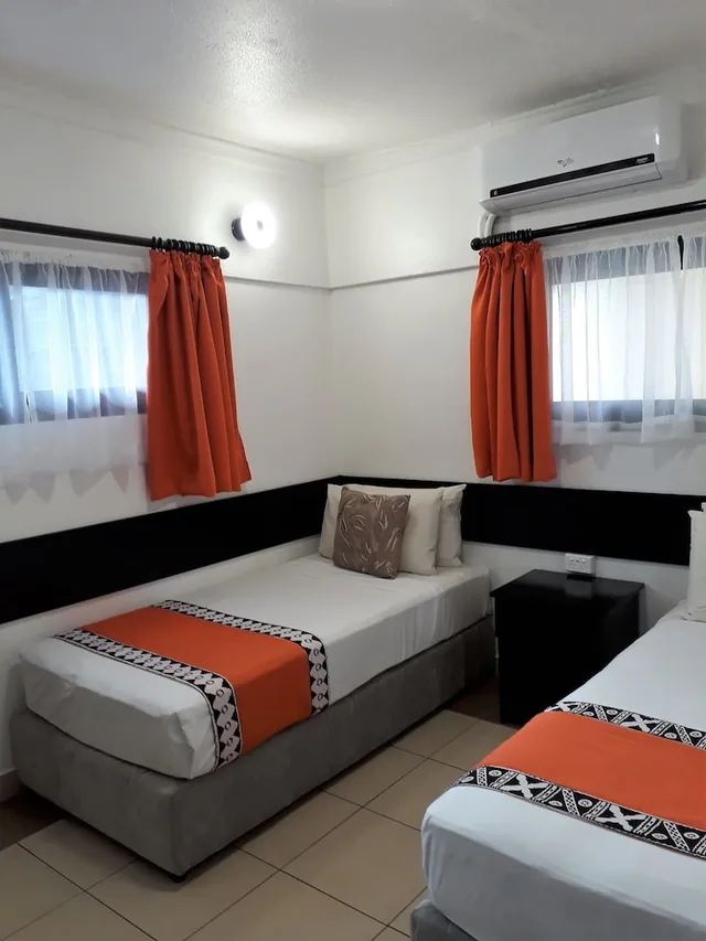 شقة ديلوكس بسريرين منفصلين بغرفتي نوم مع أريكة، Suva Motor Inn 3/9