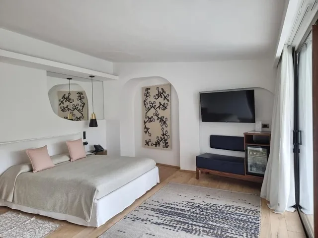 جناح جونيور ديلوكس بسرير مزدوج وسرير فردي مع أريكة، Hotel Delle Rose a Luxury Boutique Hotel 2/6