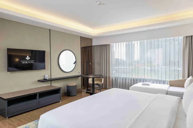 غرفة عائلية بسرير كينج مع أريكة، ARTOTEL Suites Mangkuluhur 2/2