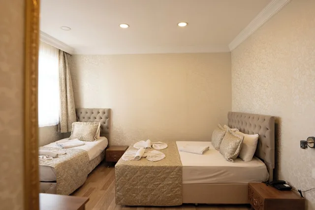 غرفة سوبيريور ثلاثية بسرير مزدوج وسرير فردي، Angel's Garden Hotel 2/10