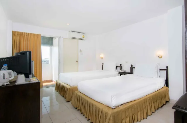 غرفة قياسية بسرير مزدوج أو سريرين منفصلين، The Phoenix Bangkok 3/4