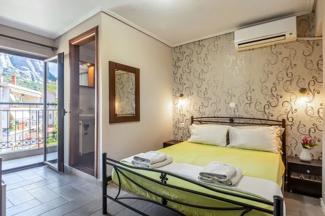غرفة بسرير مزدوج بإطلالة على الجبل، Toti Boutique Rooms 5/10
