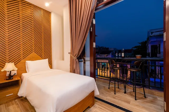 Deluxe, Triple, 1 King and 1 Single Beds, City View, Balcony, Phong Phu Villa Hoi An 5/6