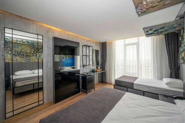 غرفة ديلوكس ثلاثية بسرير مزدوج وسرير فردي، Continental Airport Hotel 4/5