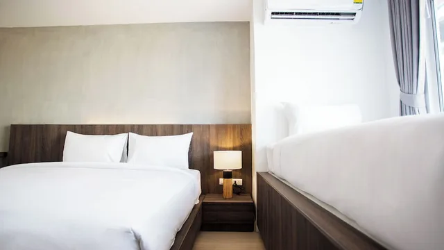 غرفة ديلوكس ثلاثية بسرير مزدوج وسرير فردي، B2 Hat Yai Premier Hotel 3/8