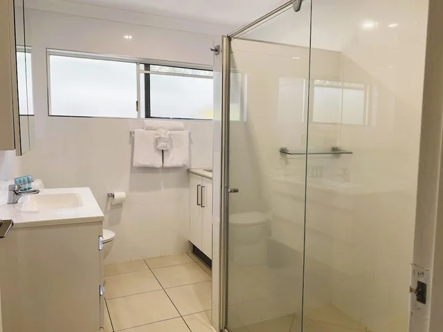 شقة ديلوكس بسرير كينج وسريرين منفصلين، Lychee Tree Holiday Apartments 4/4