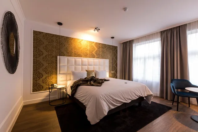 جناح جونيور بسرير كينج بإطلالة على الحديقة، Hotel Rubens - Grote Markt 1/6