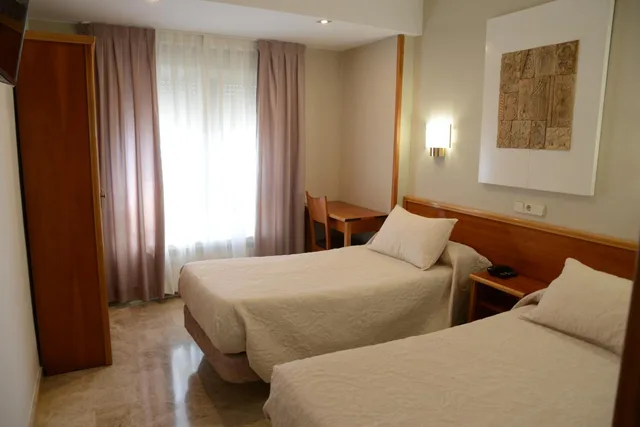 غرفة بسريرين منفصلين، Hotel Escudero 1/4
