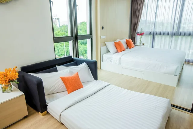 غرفة ديلوكس ثلاثية بسرير كوين وسرير فردي، Connext Residence 1/10