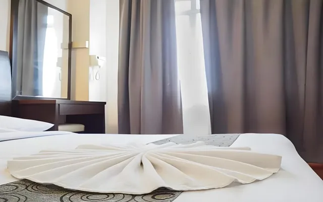 غرفة بريميوم بسرير كوين بـ3 غرف نوم، Glory Beach Resort 5/7
