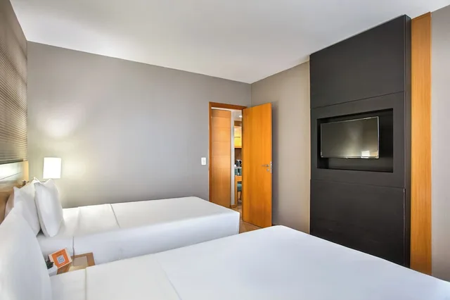 غرفة قياسية بسريرين منفصلين، Brasil 21 Suites Affiliated by Melia 5/10
