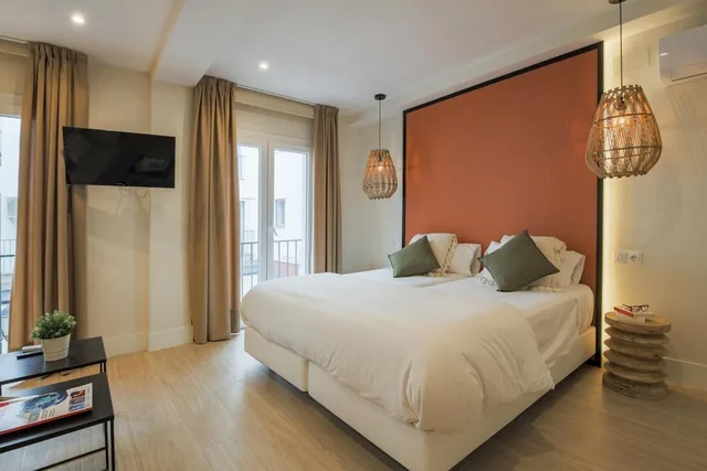 جناح استوديو كلوب بسرير كوين مع أريكة، Apartamentos Magna Sevilla 1/3