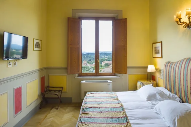 غرفة قياسية بسرير كوين بإطلالة على الحديقة، Palazzo Ravizza 1/4