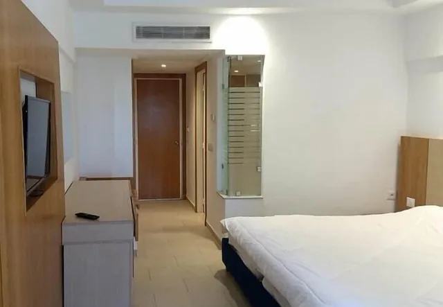 غرفة قياسية رباعية بسرير مزدوج وسريرين منفصلين، Hotel Golf Residence 7/10