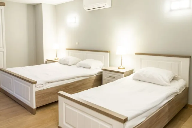 شقة ديلوكس بسريرين كوين وسريرين منفصلين مع أريكة، Wellness Apart Hotel 1/2