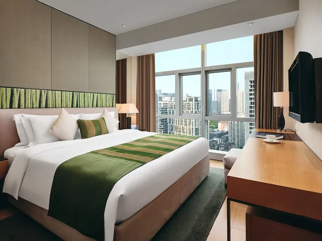 غرفة ديلوكس بسرير كينج، Grand ParcVue Hotel Residence Chengdu 1/5