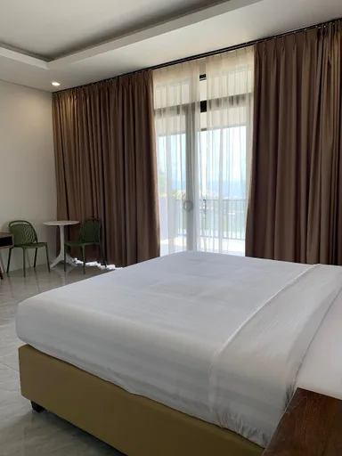 غرفة ديلوكس بإطلالة على المدينة، Wind Hill Mountain View Resort 1/2