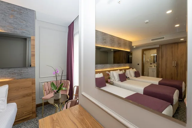 غرفة كومفورت ثلاثية بسرير كينج وسرير فردي، Graziella Gold Hotel 3/3