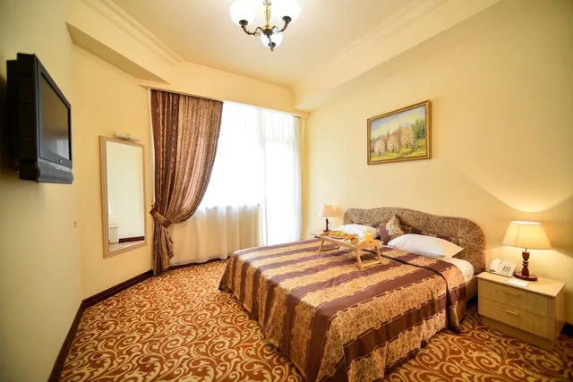 جناح جونيور بسرير كينج مع أريكة، METROPOL HOTEL 1/4