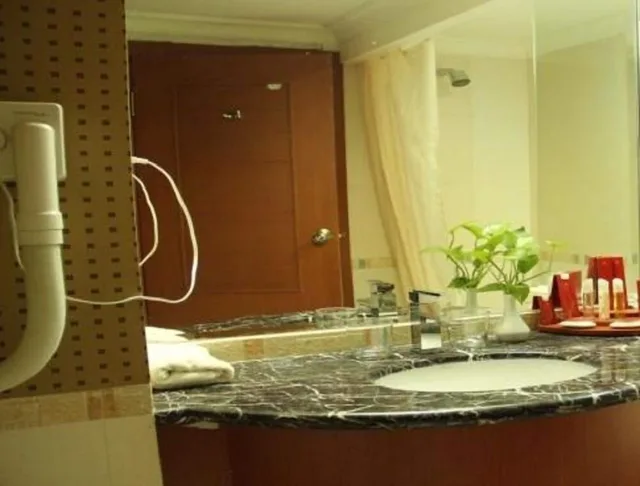 غرفة ديلوكس بسرير كوين، Abadi Suite Hotel and Tower 4/5