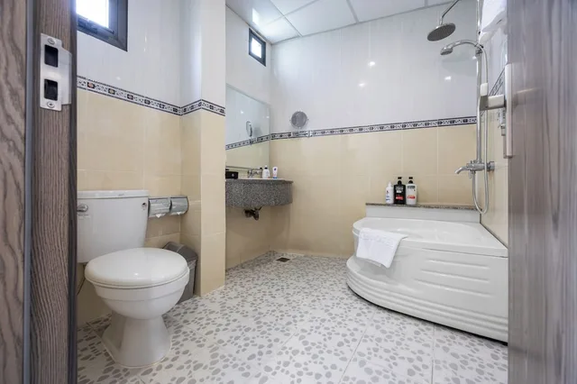 غرفة عائلية ثلاثية بسرير كوين وسرير فردي، A25 Hotel - 65G Nguyen Thai Hoc 9/10