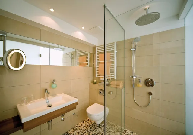 غرفة ثلاثية بسرير كينج مع أريكة، Parkhotel Oberhausen 4/4