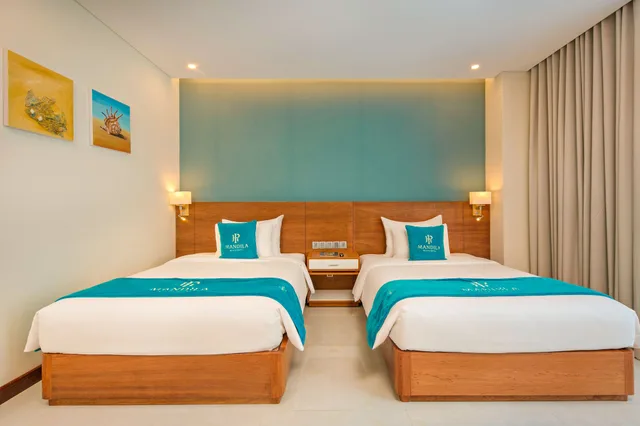 غرفة ديلوكس بسريرين مزدوجين بإطلالة جزئية على البحر، Mandila Beach Hotel Danang 6/10