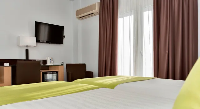 غرفة سوبيريور بسرير مزدوج أو سريرين منفصلين، Hotel Baviera 1/4