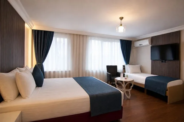 غرفة ديلوكس بسرير كوين وسرير فردي، Nar Sultan Hotel 8/10