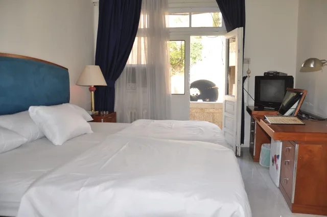 غرفة رباعية بأربعة أسرّة، Newpark Hotel Amman 1/8