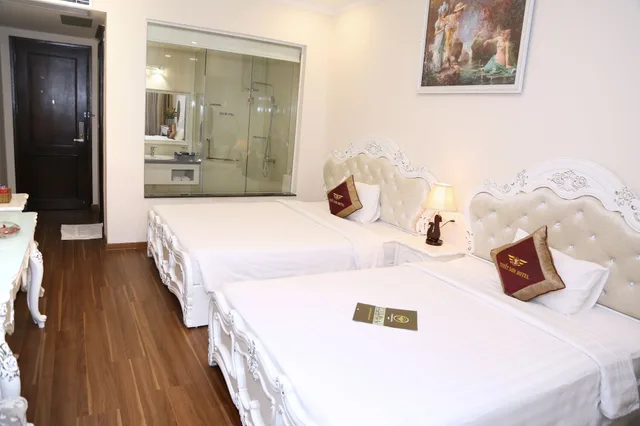 غرفة ديلوكس بسرير مزدوج وسرير فردي، Tuyet Son Hotel 5/9