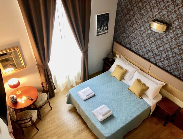 غرفة ديلوكس بسرير كوين مع أريكة، Navona Residenza De Charme 4/10