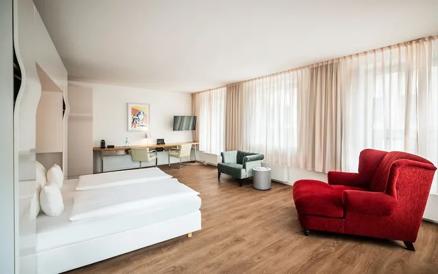 غرفة عائلية بسرير كينج مع أريكة، Art Hotel City Leipzig 3/6