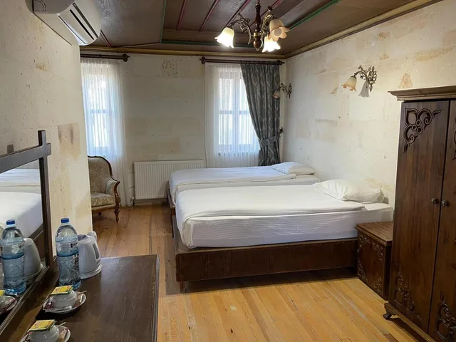 غرفة بسرير مزدوج أو سريرين منفصلين بحمام خاص، Empire Cave Hotel 1/4