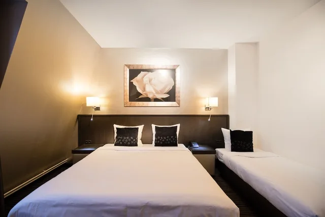 غرفة كومفورت ثلاثية بثلاثة أسرّة، Hotel de Duif 1/4
