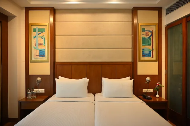 جناح ديلوكس بسريرين منفصلين بإطلالة على المدينة، Savoy Suites Greater Noida 7/8
